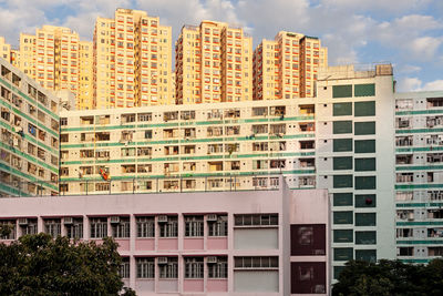 Modern buildings against sky in city