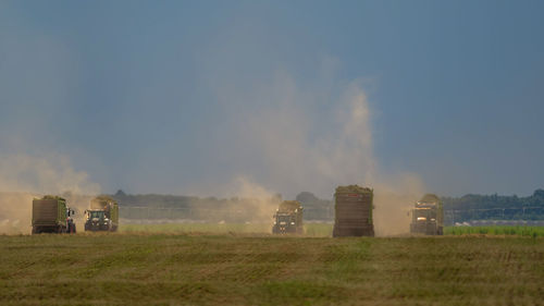 Built structure on field against sky