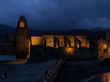 Illuminated historic building against sky at night