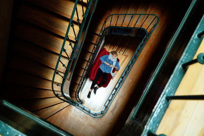 High angle view of people on spiral staircase