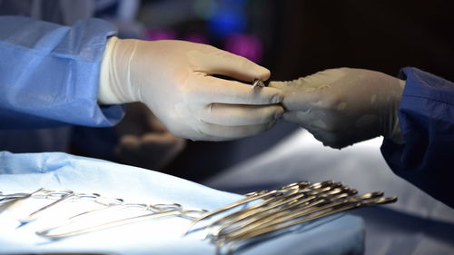 Close-up of hand holding ring