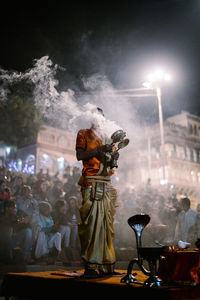 Statue of buddha in temple at night