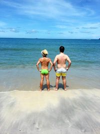 Boy standing on beach