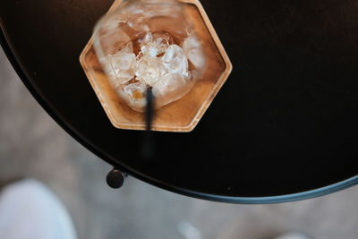 High angle view of ice in glass