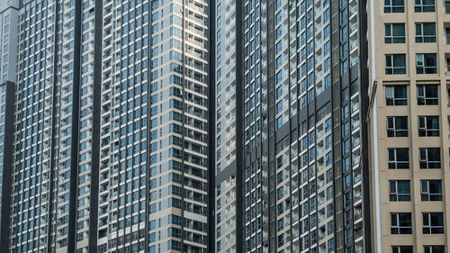 Low angle view of modern buildings in city