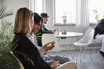 People sitting in waiting room