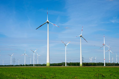 Modern wind turbines in a rural area in germany