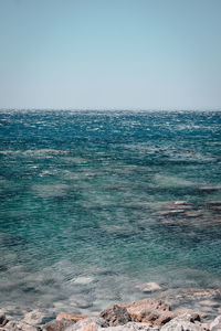 Scenic view of sea against clear sky