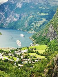 High angle view of townscape by sea