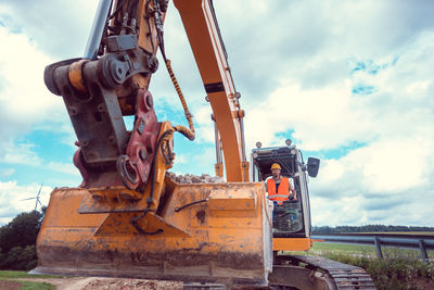 View of machinery at construction site against sky