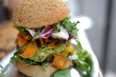 Close-up of burger in plate on table