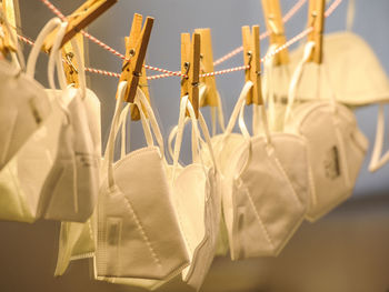 Close-up of clothes hanging on clothesline