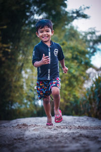 Full length of a boy smiling
