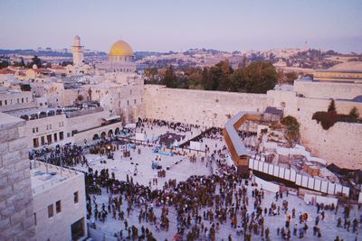 High angle view of crowd in a ceremony in front of the western wall, jerusalem.