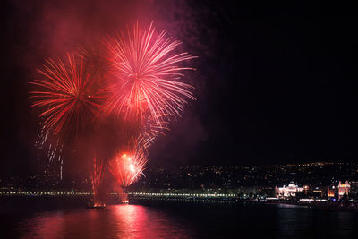 Firework display at night