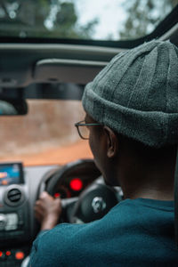 Portrait of man in car