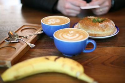 Close-up of coffee cup on table