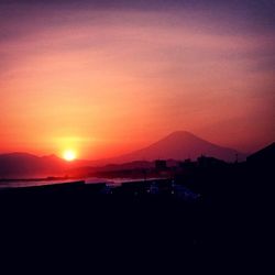 Scenic view of mountains at sunset