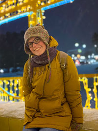 Portrait of a smiling young woman in winter