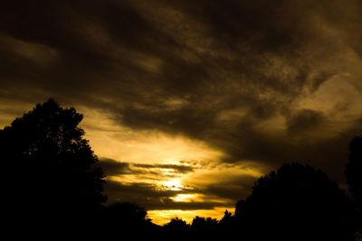 Low angle view of dramatic sky during sunset