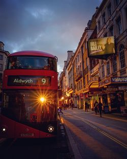 View of city street at sunset