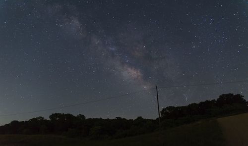 Low angle view of stars against sky at night