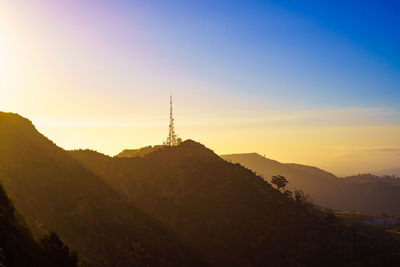 Scenic view of mountains against sky during sunset