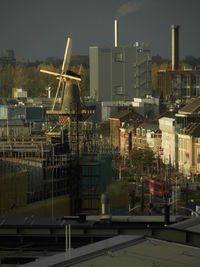 Buildings in city against sky