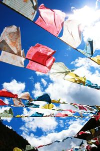 Low angle view of flag against sky