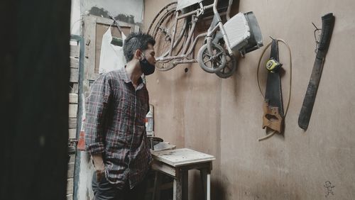 Man working on wall