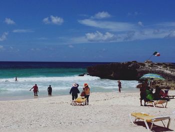 People on calm beach