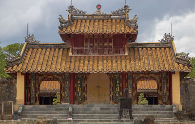 Low angle view of temple against building