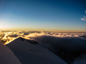 Aerial view of cloudscape against sky during sunset