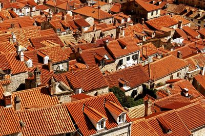 Full frame shot of houses in city on sunny day