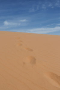 Scenic view of desert against sky