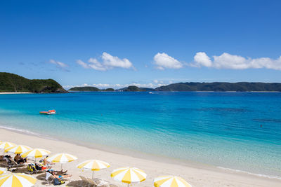 Scenic view of sea against blue sky