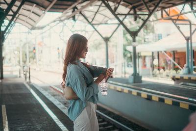 Young woman using mobile phone