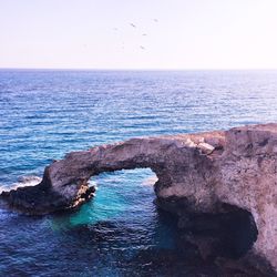 Scenic view of sea against clear sky