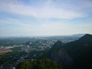 Aerial view of cityscape against sky