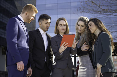 Business colleagues discussing in office