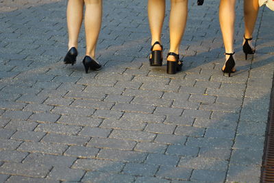 Low section of people walking outdoors