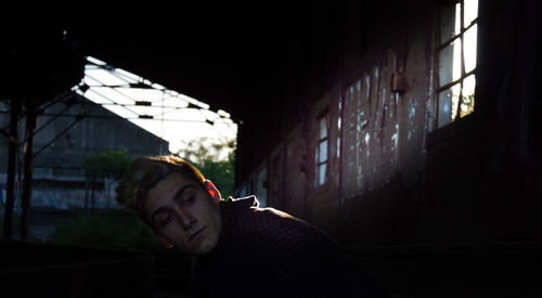 Portrait of young man looking away