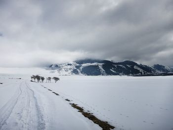 Scenic view of snow covered mountains