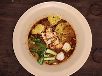 Directly above shot of soup served on table