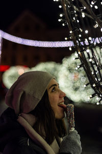 Young woman eating ice cream