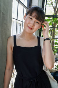 Portrait of young woman smiling