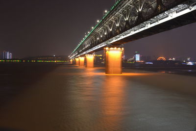 Low angle view of bridge at night