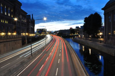 High angle view of light trails on road at night