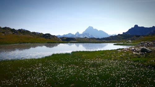 Scenic view of lake with mountains in background