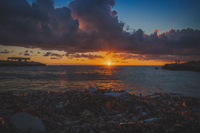 Scenic view of sea against sky during sunset